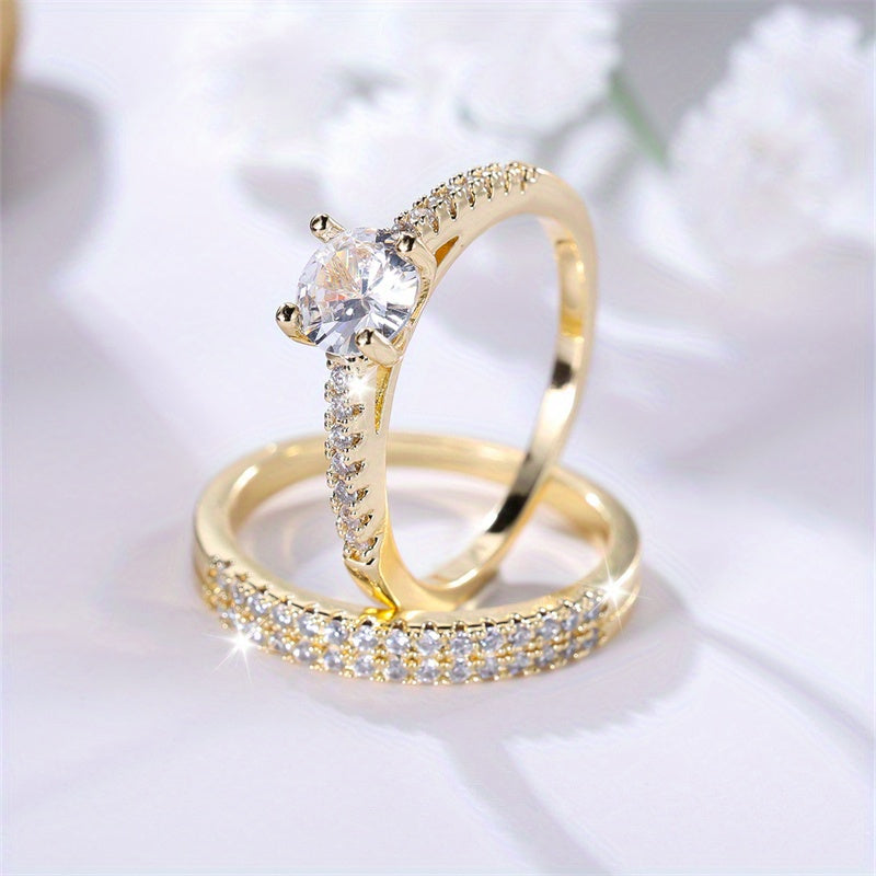 Set of 2 Luxurious Golden Rings Featuring Round-Cut White Stones with Four Claws, Perfect for Weddings And As Jewelry Gifts