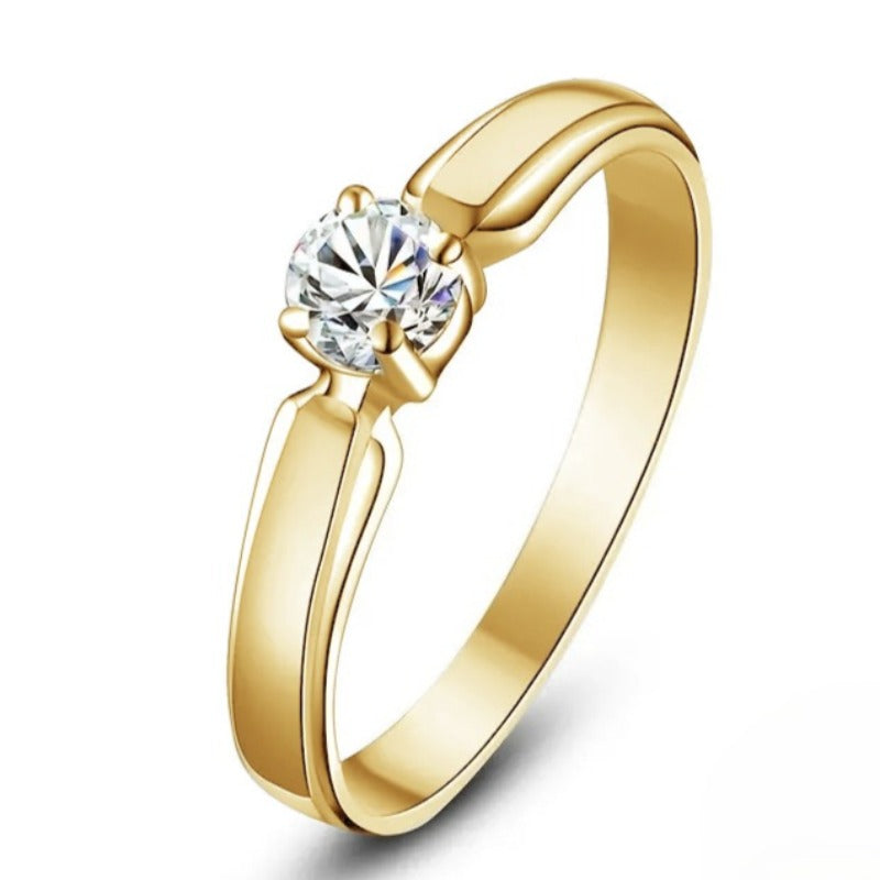 A Timeless 4-Claw Set Round Zirconia Engagement Ring for Women, Perfect for Everyday Dating, Proposals, And Bridal Occasions. This Simple Yet Elegant Golden Ring Is Ideal for Parties And Special Events.