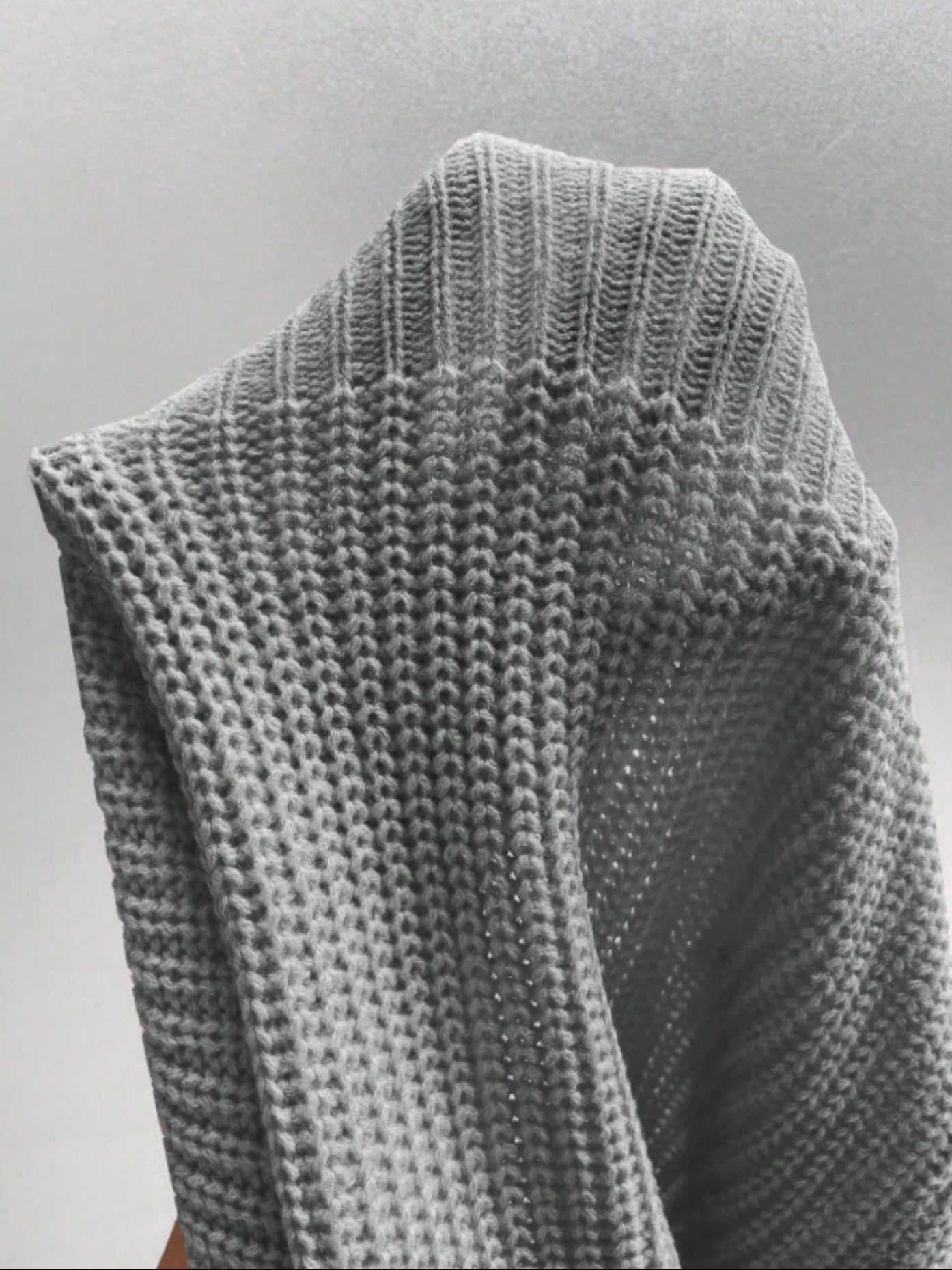 Pull à épaule unique style col haut et manches dénudées, élégant et sophistiqué