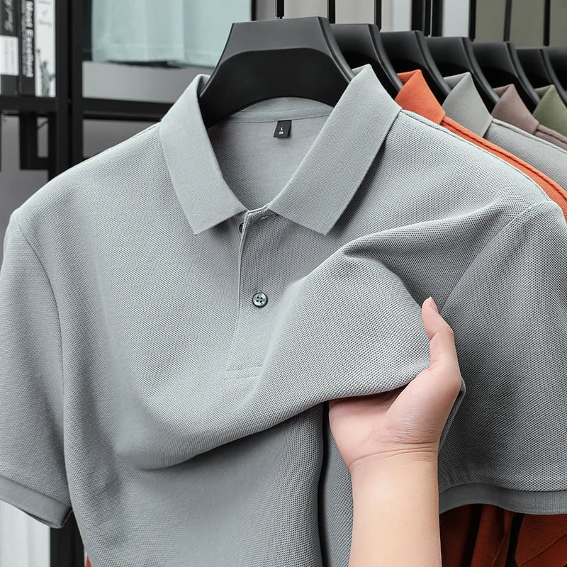 Polo à manches courtes pour hommes 100% coton confortable haut de gamme tempérament respirant décontracté été nouveau haut de couleur unie