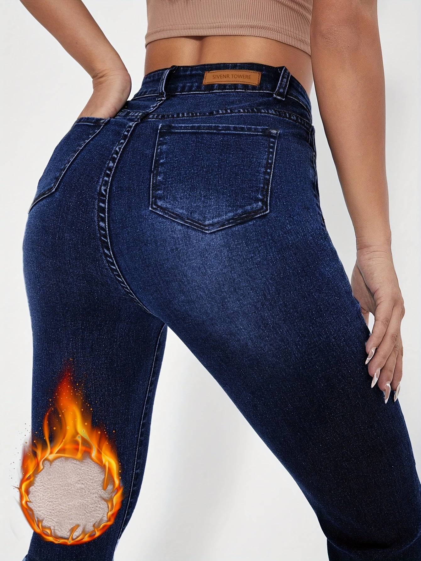 Pantalon en jean bleu délavé taille haute, doublé peluche, coupe évasée, fermeture éclair et bouton, style décontracté