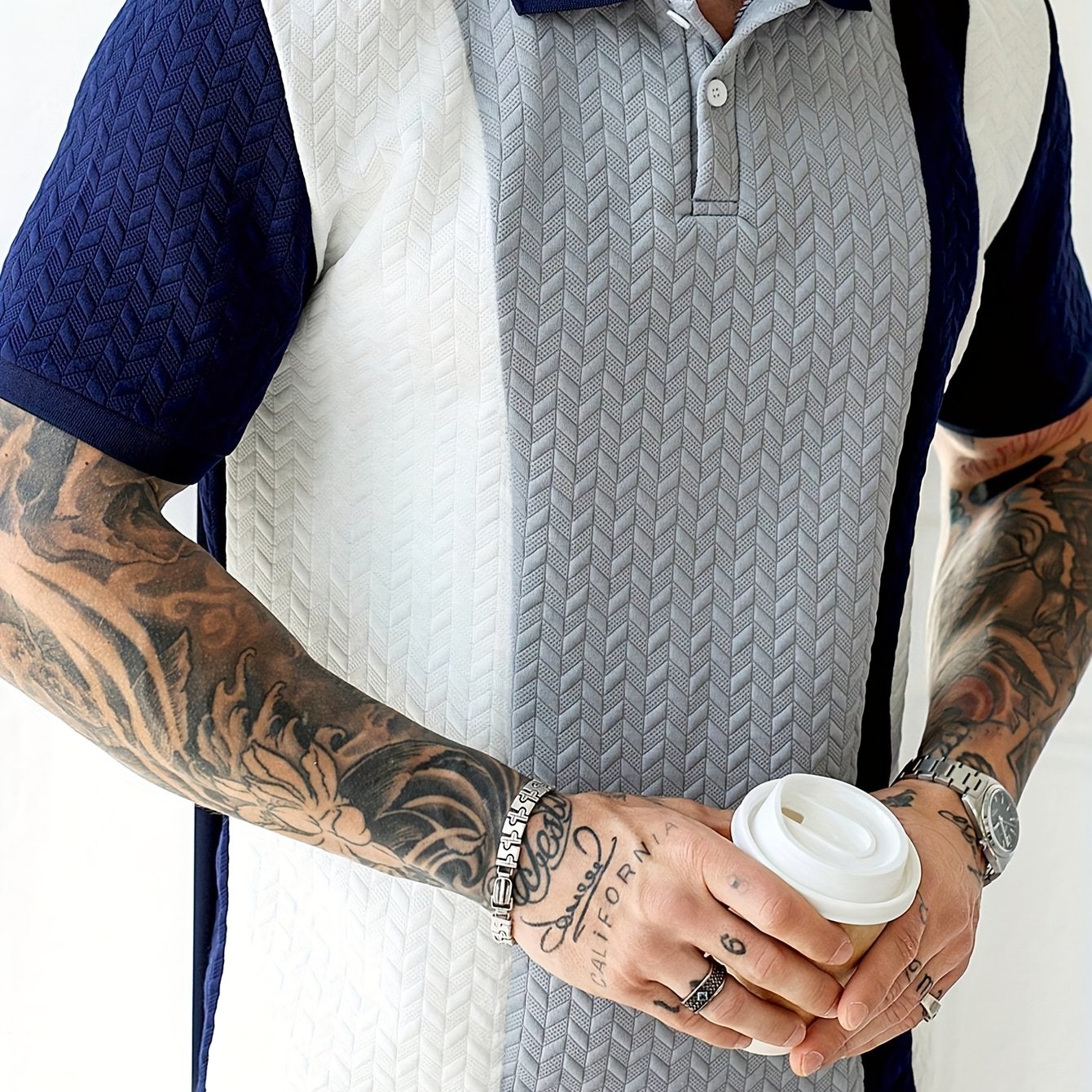 Men'S Short-Sleeve Polo Shirt with a Patchwork Design, Featuring Buttons And a Textured Knit, Perfect for Casual Summer Wear with a Stylish And Comfortable Fit.