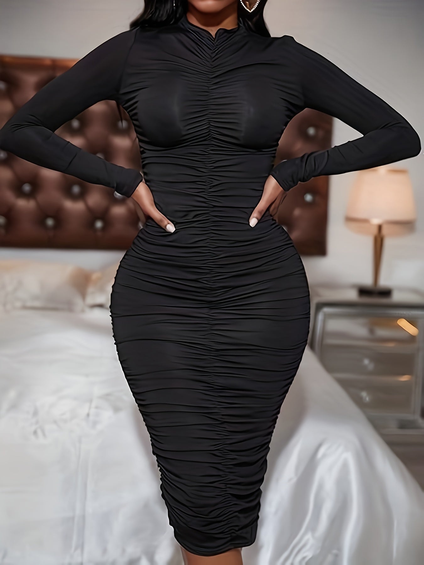 This Solid Color Long-Sleeve Dress with Pleats Is Perfect for Everyday Wear And Creates a Effect.