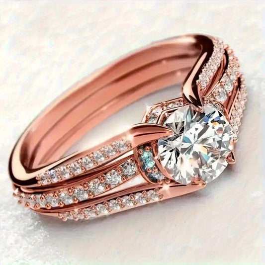 Bague de fiançailles élégante avec zircon cubique synthétique étincelant. Bijou de luxe pour femmes, parfait comme cadeau. Disponible en couleur argentée ou or rose