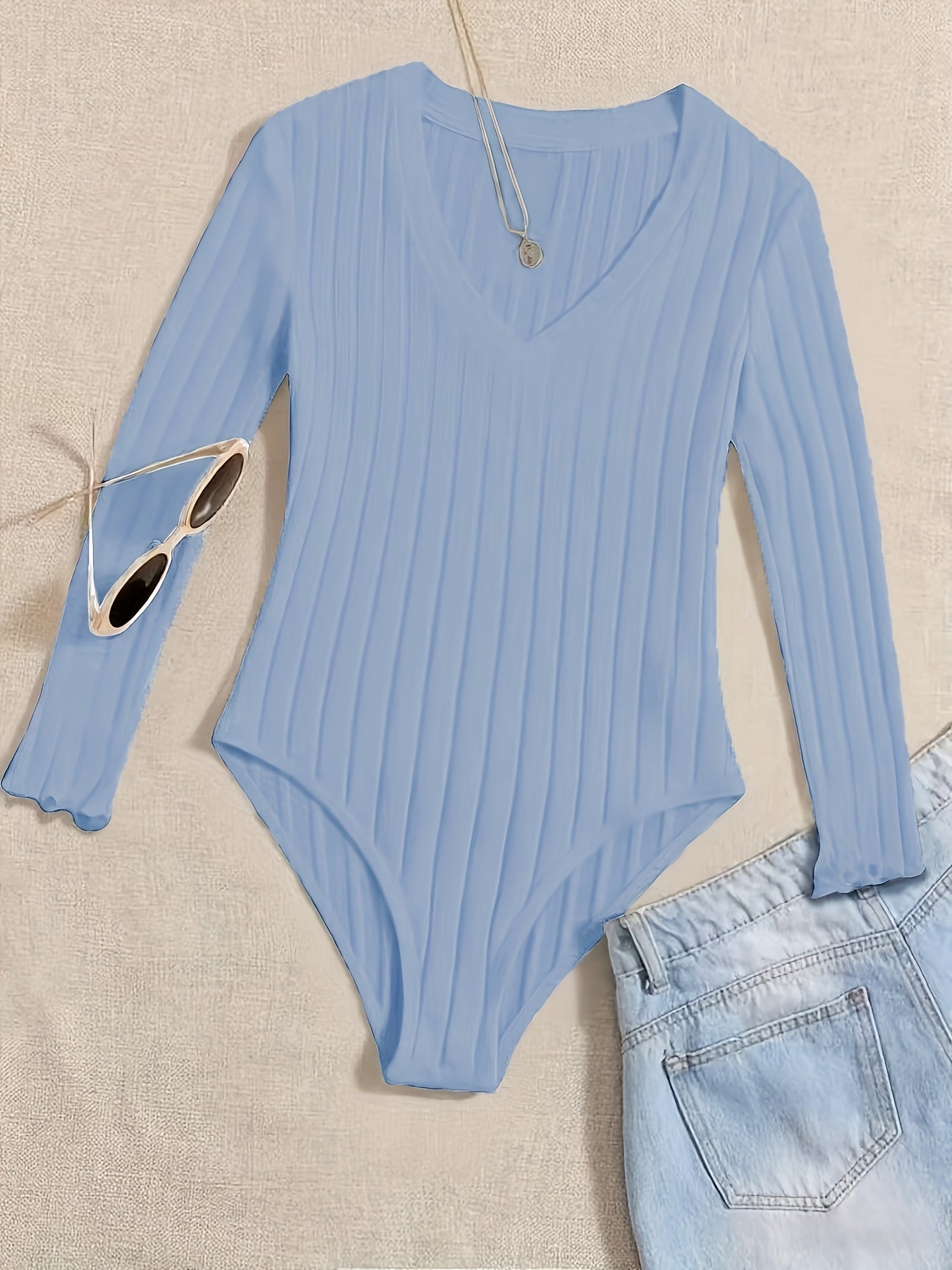 Body moulant femme vert foncé à manches longues, détail sur les hanches, tissu côtelé doux, style décontracté, idéal pour l’automne et l’hiver, parfait pour les sorties shopping