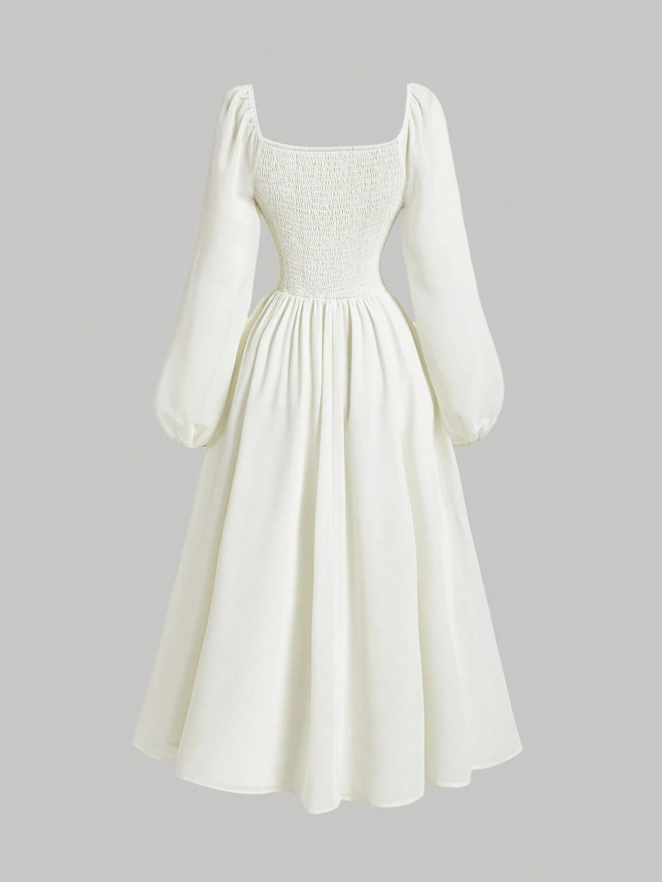Robe élégante, moderne et raffinée, avec manches lanternes à volants et taille cintrée