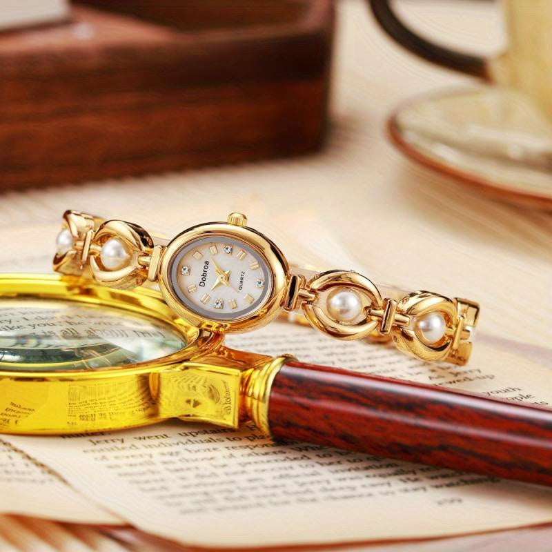 Montre femme vintage, bracelet en alliage doré, mouvement quartz, cadran ovale, détails élégants, cadeau idéal pour la fête des mères, la Saint-Valentin ou occasions spéciales