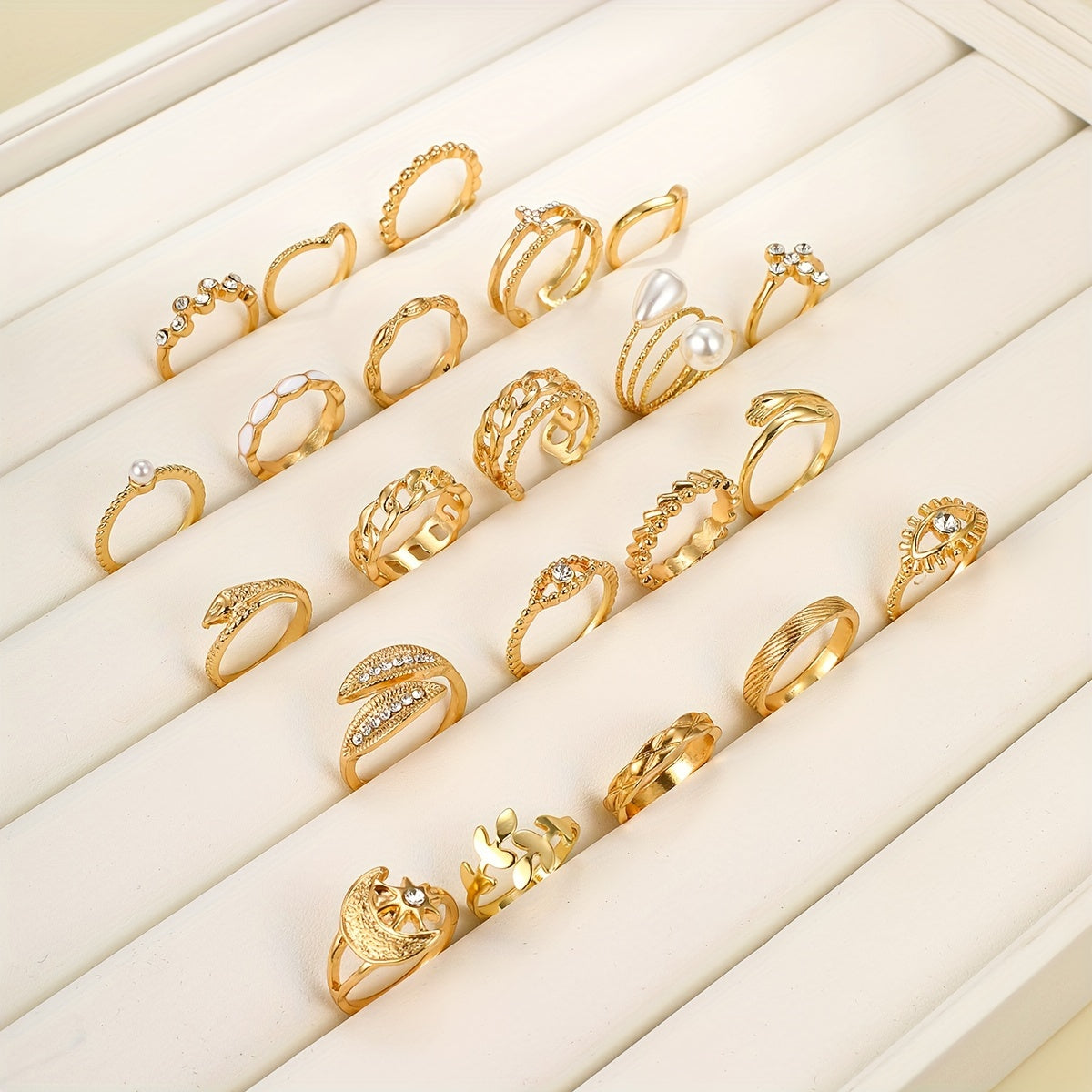 A Set of 22 Stylish Vintage Rings Featuring Leaves, Eyes, Moons, Crosses, Rhinestones, And Faux Pearls, Perfect for Parties, Dates, And Everyday Wear.