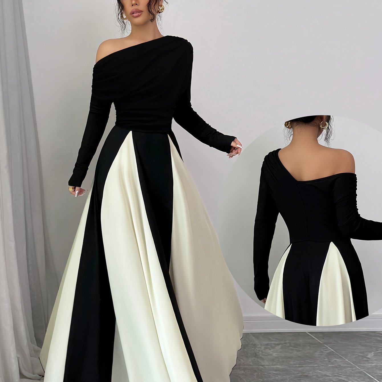 A Stylish And Elegant Long-Sleeve Dress with a Slanted Shoulder, Featuring Fine Ribbing, a Fitted Waist, And a Flared Hem, Perfect for Autumn And Winter.