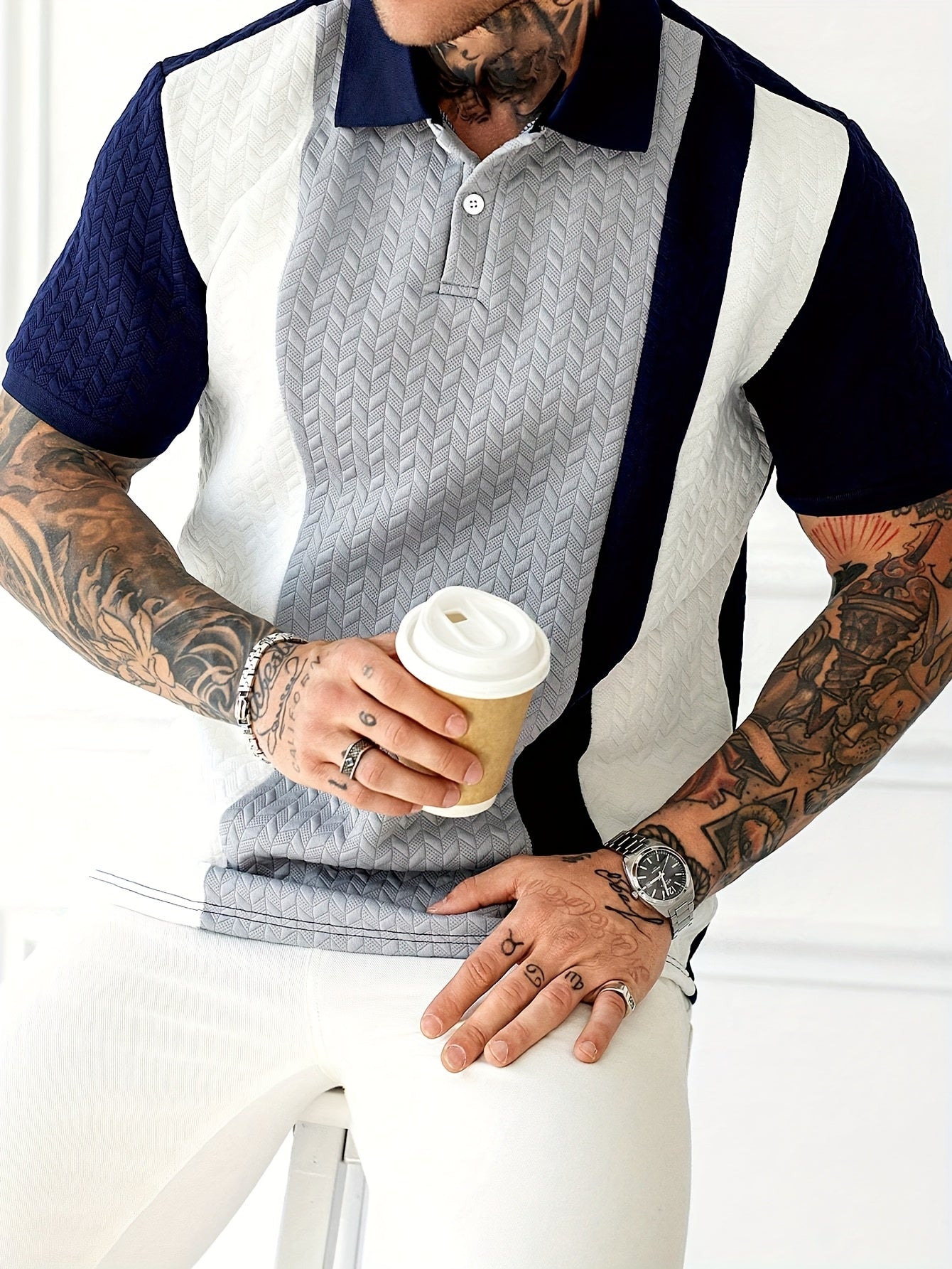 Men'S Short-Sleeve Polo Shirt with a Patchwork Design, Featuring Buttons And a Textured Knit, Perfect for Casual Summer Wear with a Stylish And Comfortable Fit.