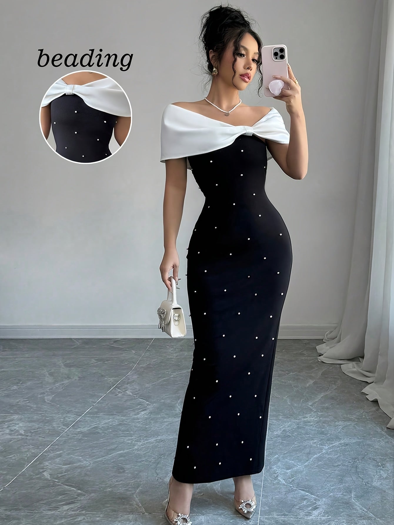 A Black Beaded Off-Shoulder Dress Featuring Elegant Heavy Embellishments, Perfect for Banquets And Dates, Designed to Create a Effect And Showcase a Goddess-Like Silhouette.