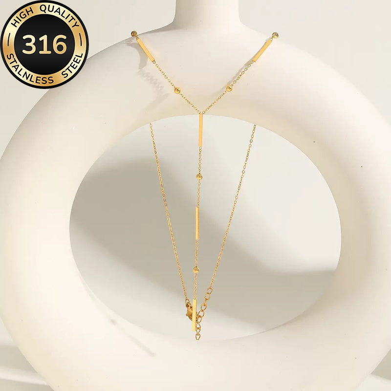 Collier Femme Hypoallergénique – Acier Inoxydable en Y avec Perles Riz, Plaqué Or 18K, Pendentif Long à Glands Élégant, Idéal pour Quotidien, Soirées, Halloween, Noël et Cadeaux d’Anniversaire