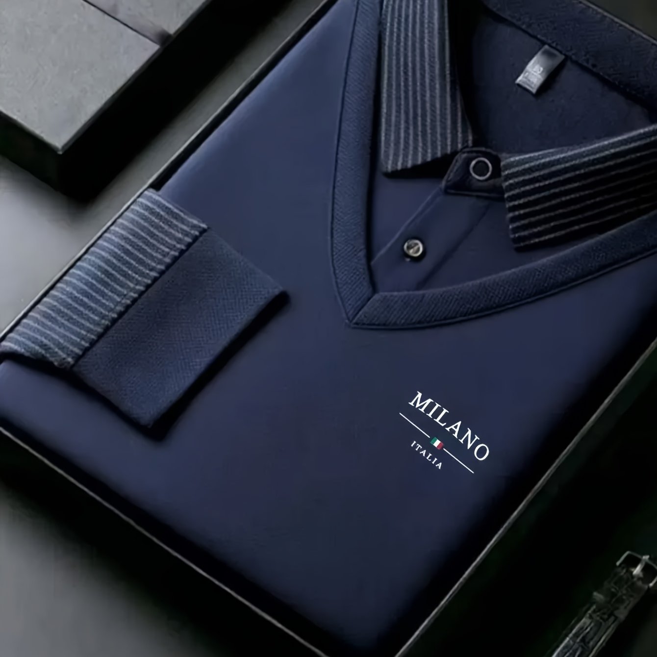 Men'S Faux Two-Piece Shirt Collar Knitwear, a Business Casual Striped Patchwork Top Featuring a Milano Letter Print Design, Available in Various Colors. It Has a Gray And Golden Contrasting Collar And Cuffs, a Simple Solid Co