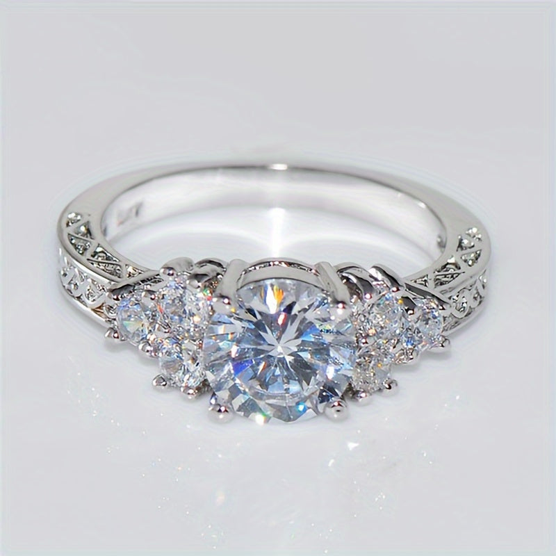 A Luxurious Engagement Ring for Women Featuring Intricate Carvings And Set with Sparkling Cubic Zirconia, Perfect for Brides at Weddings, Parties, Or Everyday Wear; a Romantic Proposal Ring.