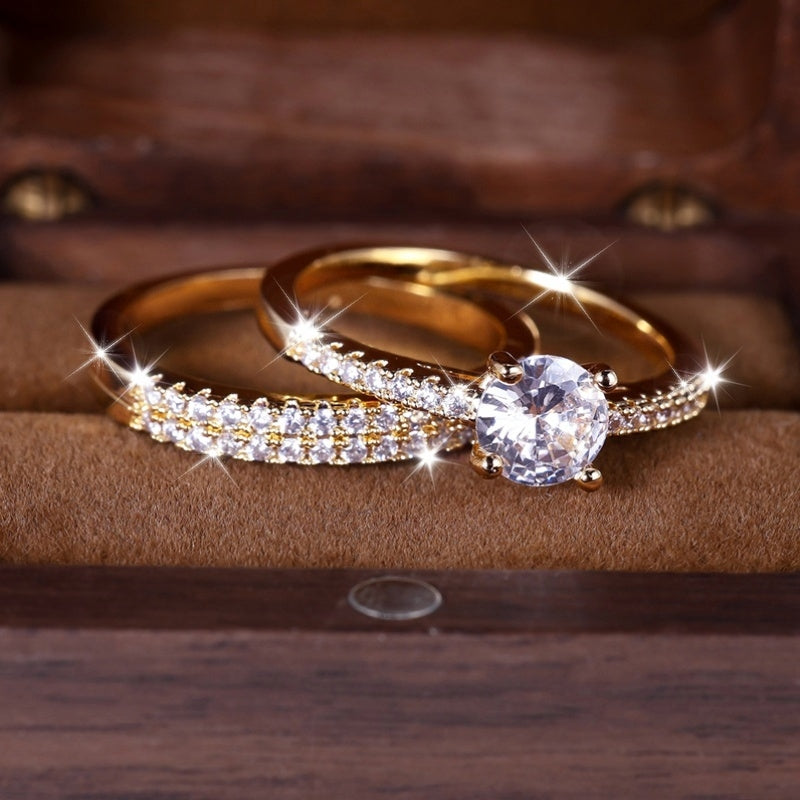 Set of 2 Luxurious Golden Rings Featuring Round-Cut White Stones with Four Claws, Perfect for Weddings And As Jewelry Gifts