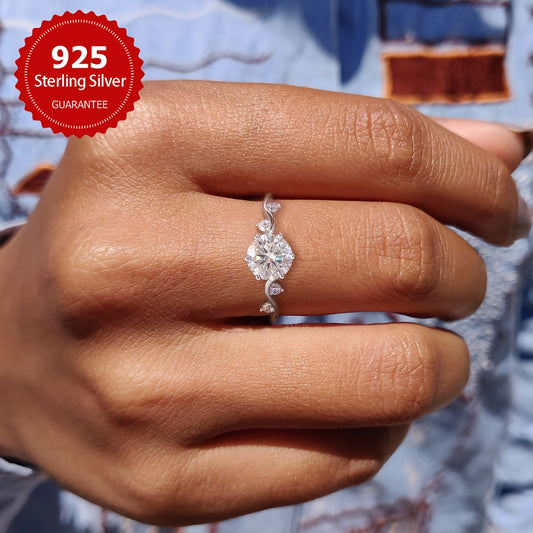 This Is a Dazzling 1-Carat Moissanite Ring Made of S925 Sterling Silver, Perfect As a Promise Ring, Wedding Or Engagement Ring for Women. It Is Ideal for Wedding Season, Anniversaries, And Makes a Luxurious Gift for Occasions