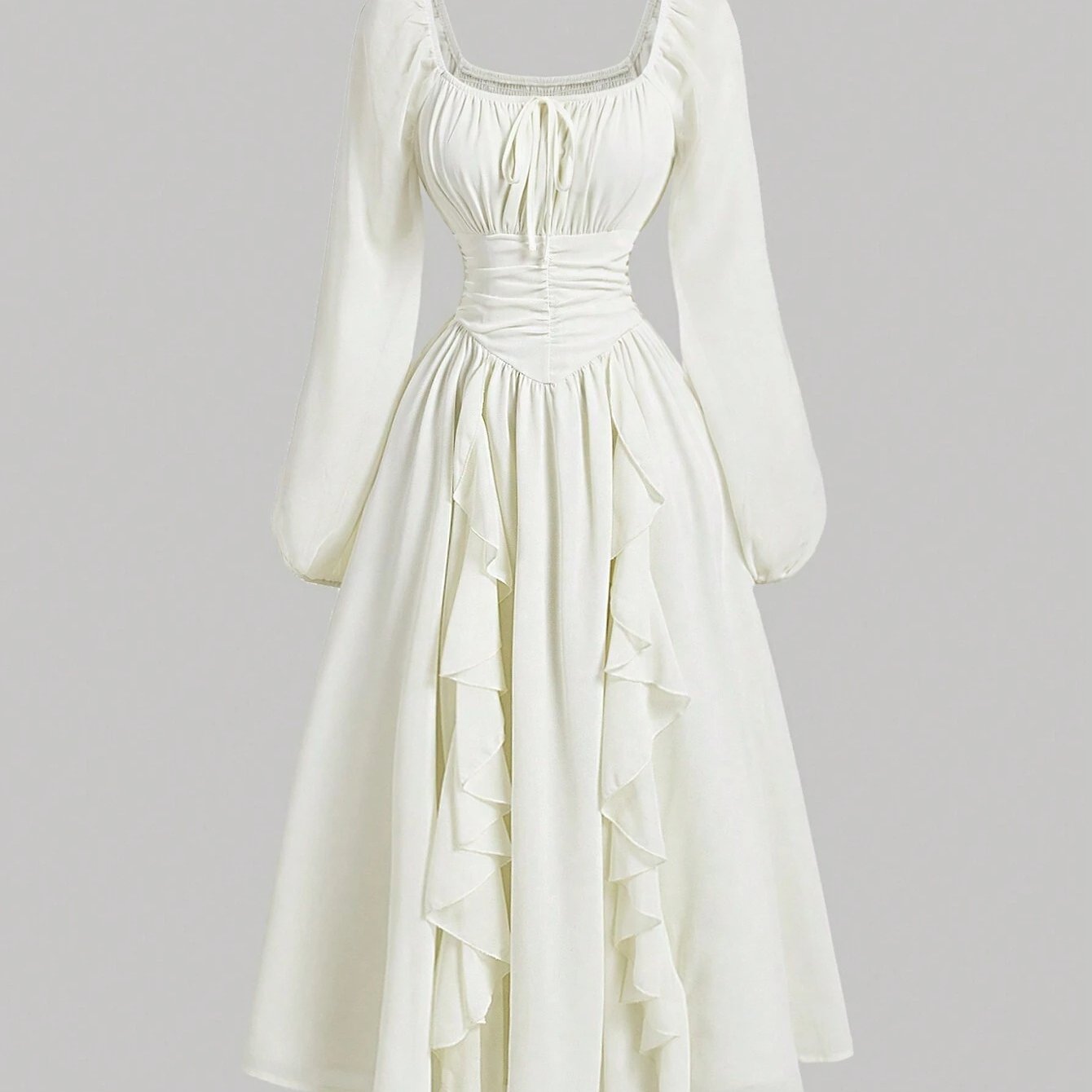 Robe élégante, moderne et raffinée, avec manches lanternes à volants et taille cintrée