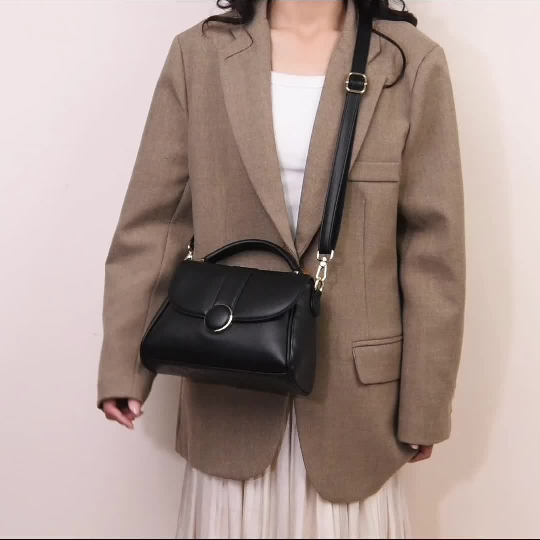 Sac bandoulière noir élégant femme poignée ronde réglable zip polyester