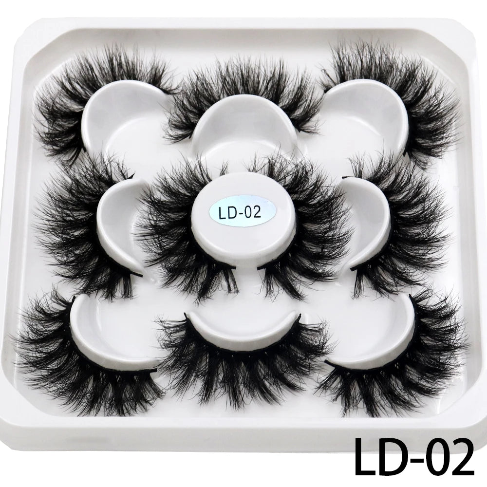 Lot de **5 paires de faux cils 3D Mink 25 mm** — effet russe volumineux et dramatique, texture moelleuse et naturelle, parfaits pour le maquillage professionnel ou quotidien.
