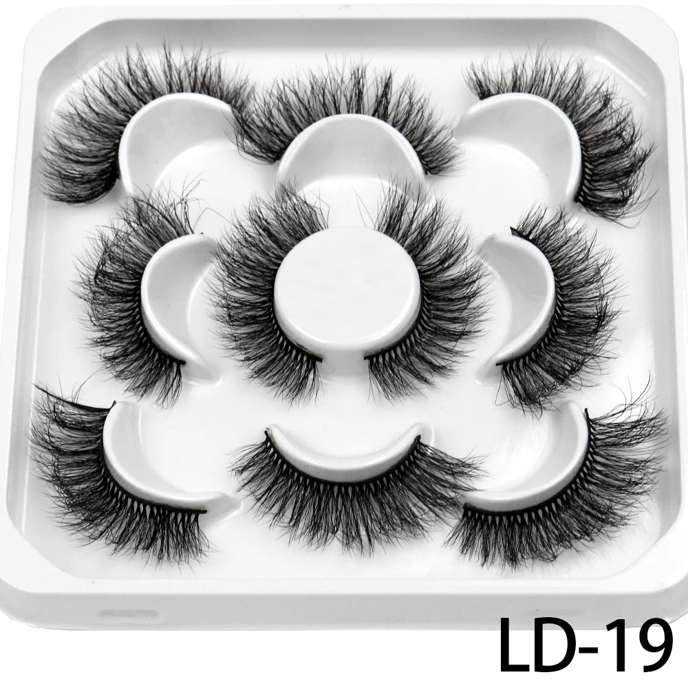 Lot de **5 paires de faux cils 3D Mink 25 mm** — effet russe volumineux et dramatique, texture moelleuse et naturelle, parfaits pour le maquillage professionnel ou quotidien.