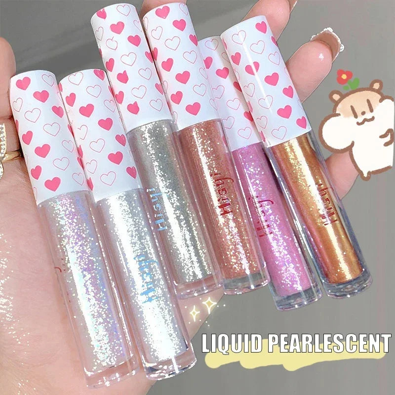 Ombre à paupières liquide illuminatrice waterproof ultra brillante longue tenue, en feuille monochrome pailletée, sublimant le fard à paupières