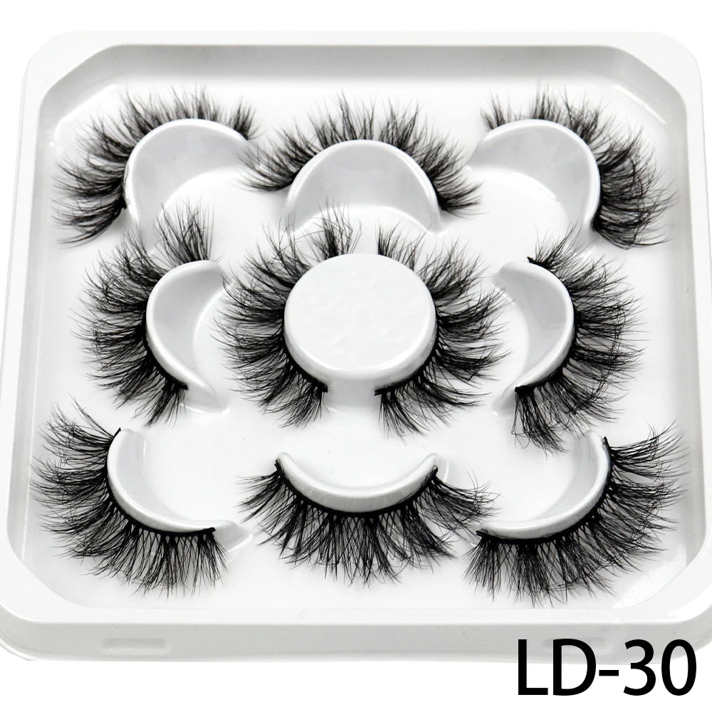 Lot de **5 paires de faux cils 3D Mink 25 mm** — effet russe volumineux et dramatique, texture moelleuse et naturelle, parfaits pour le maquillage professionnel ou quotidien.