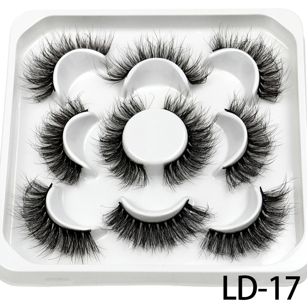 Lot de **5 paires de faux cils 3D Mink 25 mm** — effet russe volumineux et dramatique, texture moelleuse et naturelle, parfaits pour le maquillage professionnel ou quotidien.
