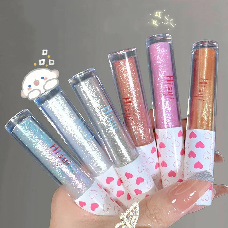 Ombre à paupières liquide illuminatrice waterproof ultra brillante longue tenue, en feuille monochrome pailletée, sublimant le fard à paupières