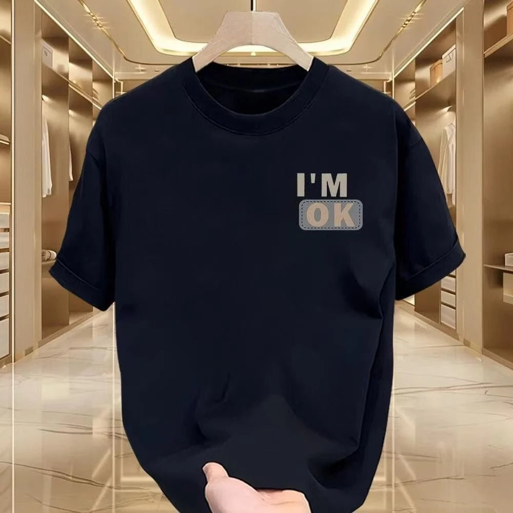 Un T-shirt élégant à manches courtes et col rond, ample, décontracté et polyvalent, imprimé