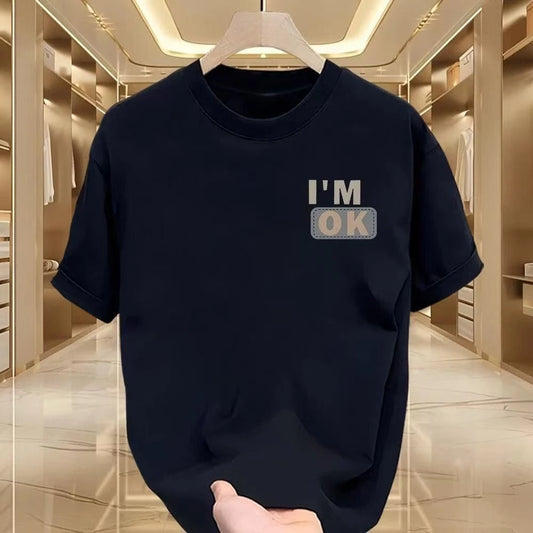 Un T-shirt élégant à manches courtes et col rond, ample, décontracté et polyvalent, imprimé