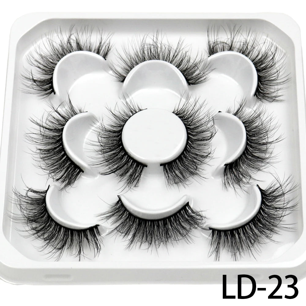 Lot de **5 paires de faux cils 3D Mink 25 mm** — effet russe volumineux et dramatique, texture moelleuse et naturelle, parfaits pour le maquillage professionnel ou quotidien.