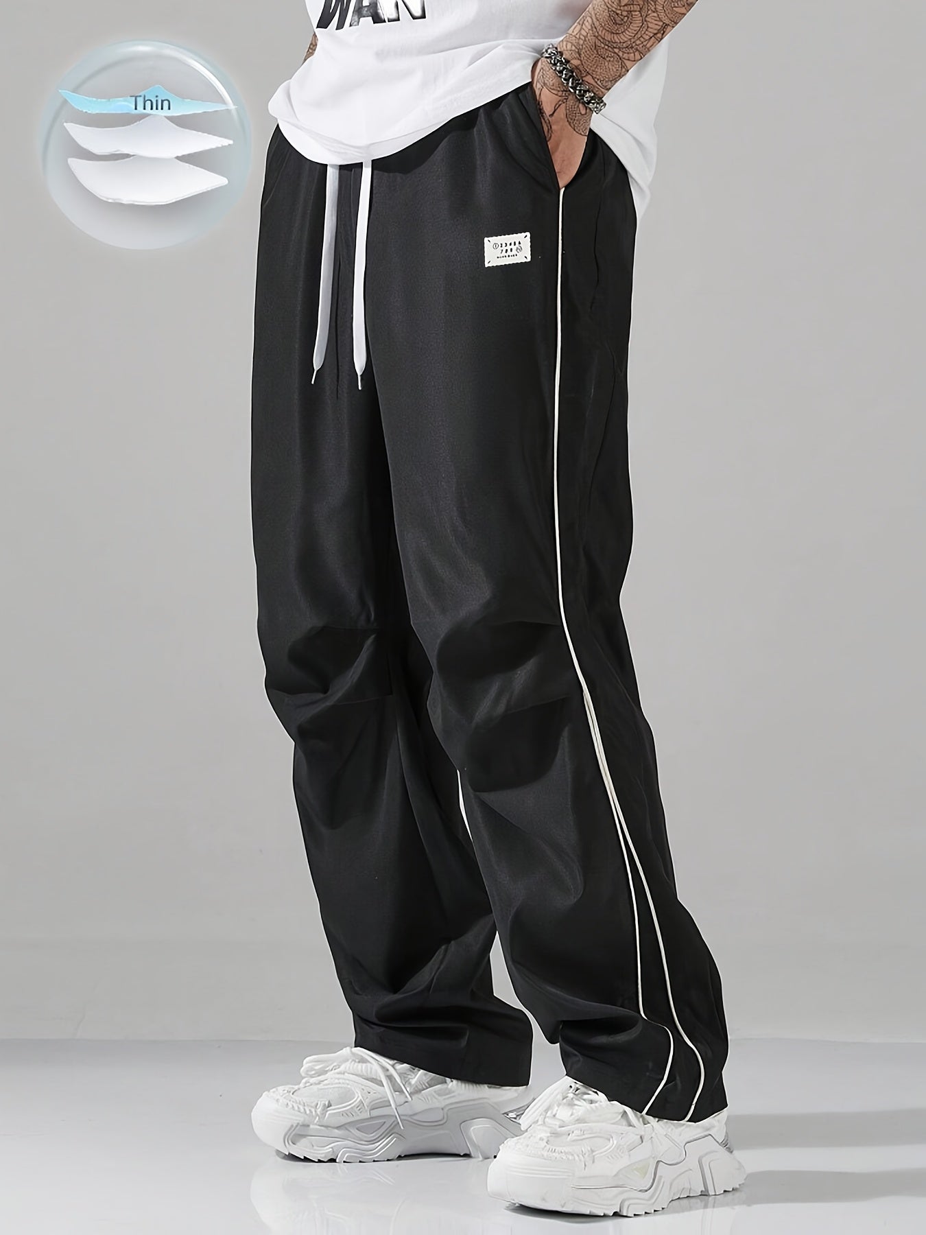 Jogging Homme Toutes Saisons – Coupe Ample, Pantalon Non-Extensible avec Bandes Latérales, Coupe Droite