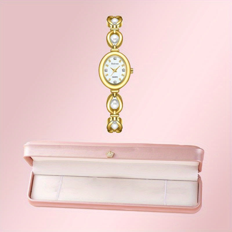 Montre femme vintage, bracelet en alliage doré, mouvement quartz, cadran ovale, détails élégants, cadeau idéal pour la fête des mères, la Saint-Valentin ou occasions spéciales