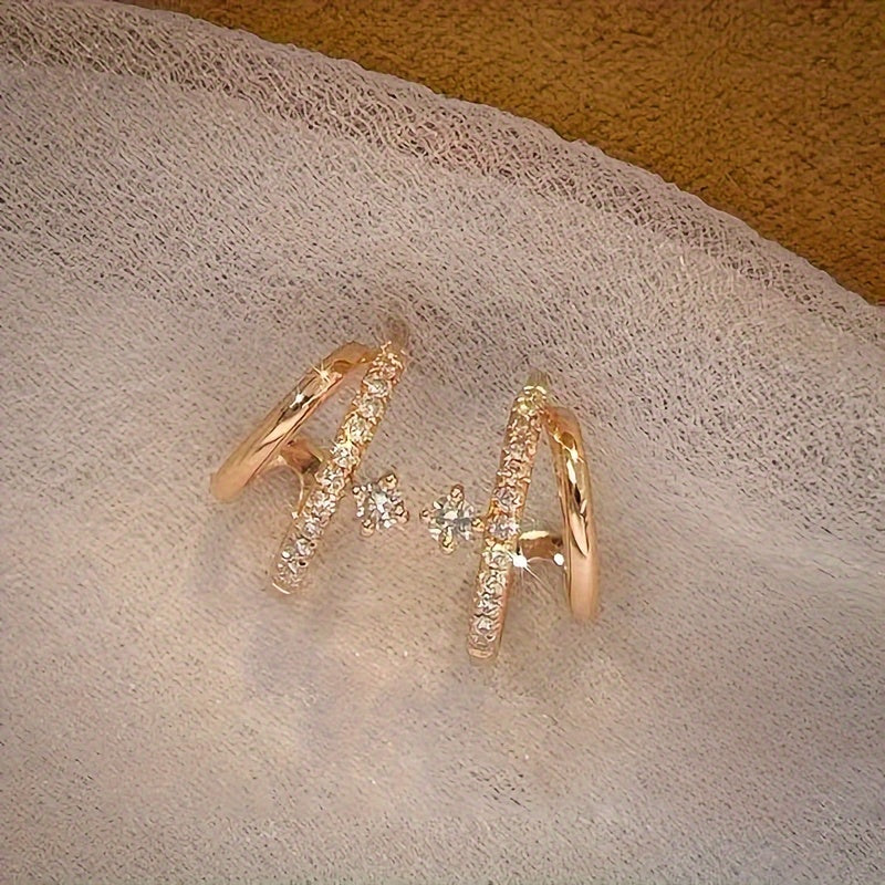 1 paire de boucles d’oreilles élégantes à double couche avec griffes, ornées de cristaux synthétiques étincelants, en acier inoxydable 316 hypoallergénique, parfaites pour un usage quotidien et les fêtes.