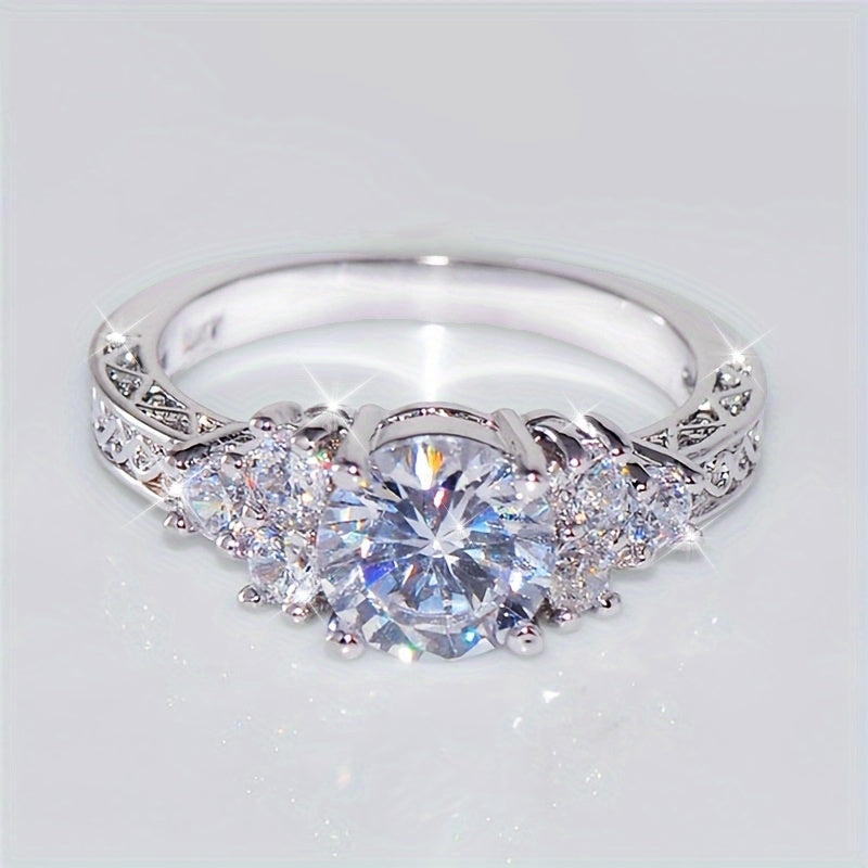 A Luxurious Engagement Ring for Women Featuring Intricate Carvings And Set with Sparkling Cubic Zirconia, Perfect for Brides at Weddings, Parties, Or Everyday Wear; a Romantic Proposal Ring.