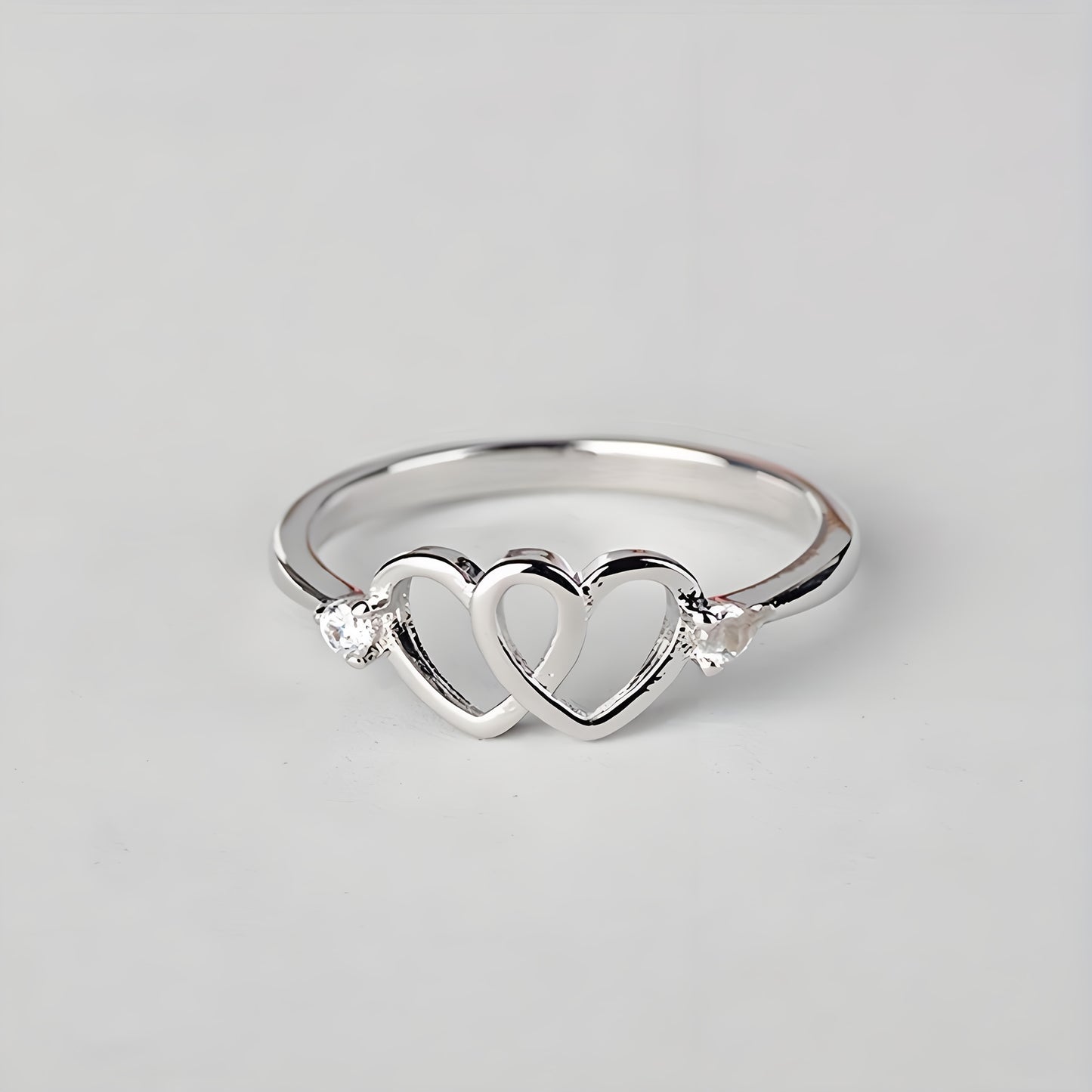 Double Heart Shaped Hollow Cubic Zirconia Ring | Cute and Easy Design, Silver Plated, Suitable for Daily and Vacation Occasions