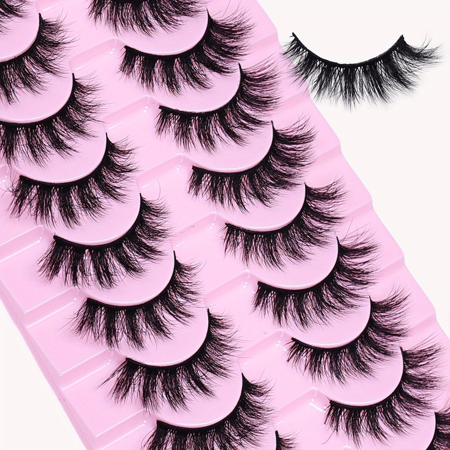 Un ensemble de 10 paires de faux cils 3D volumineux, conçus pour un regard spectaculaire, avec des cils épais et désordonnés.