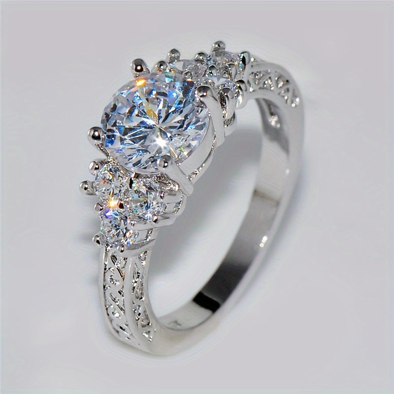 A Luxurious Engagement Ring for Women Featuring Intricate Carvings And Set with Sparkling Cubic Zirconia, Perfect for Brides at Weddings, Parties, Or Everyday Wear; a Romantic Proposal Ring.