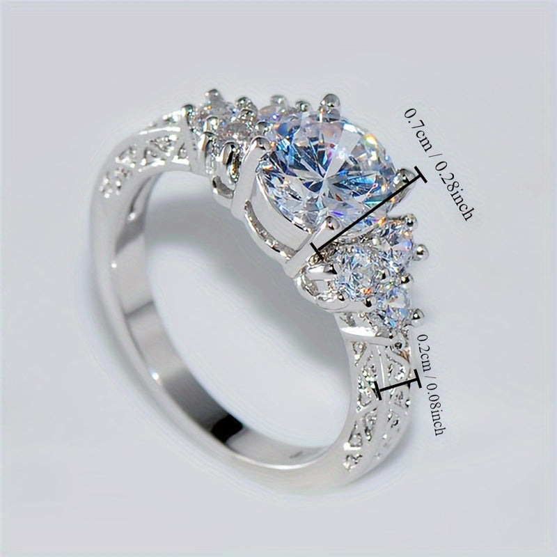 A Luxurious Engagement Ring for Women Featuring Intricate Carvings And Set with Sparkling Cubic Zirconia, Perfect for Brides at Weddings, Parties, Or Everyday Wear; a Romantic Proposal Ring.