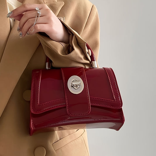 Sac à main femme élégant en similicuir bordeaux à motif crocodile, avec bandoulière ajustable, fermeture à rabat et emblème métallique